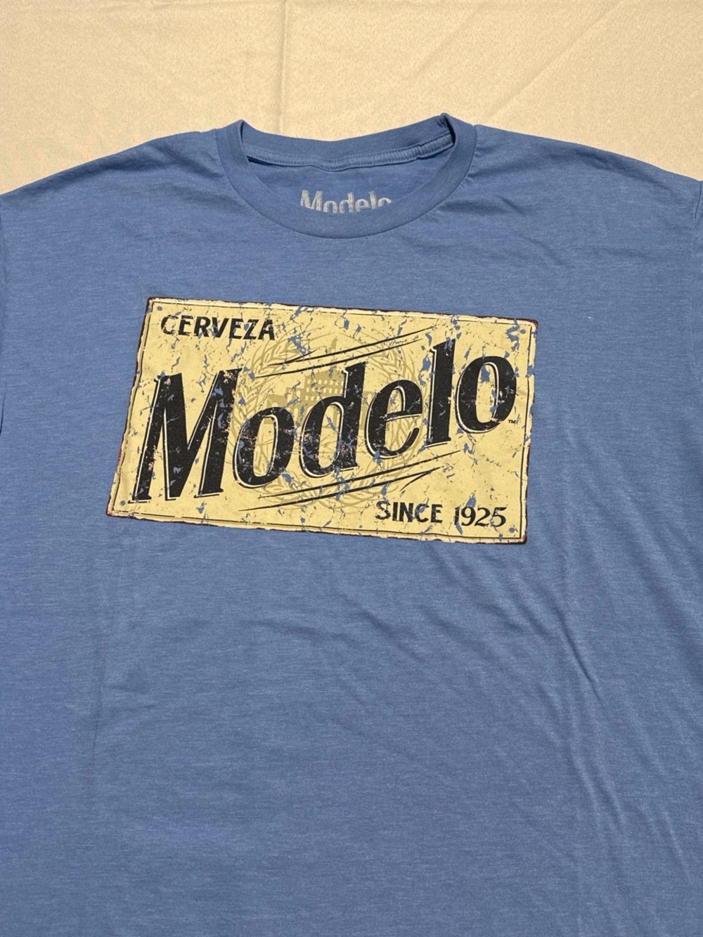 Ripple Junction Blue Short-Sleeve Tee with Yellow Modelo Graphic